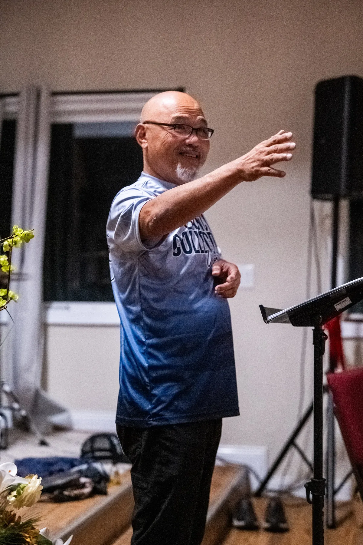 Pastor Joe Ong speaking to the team during the first opening session.