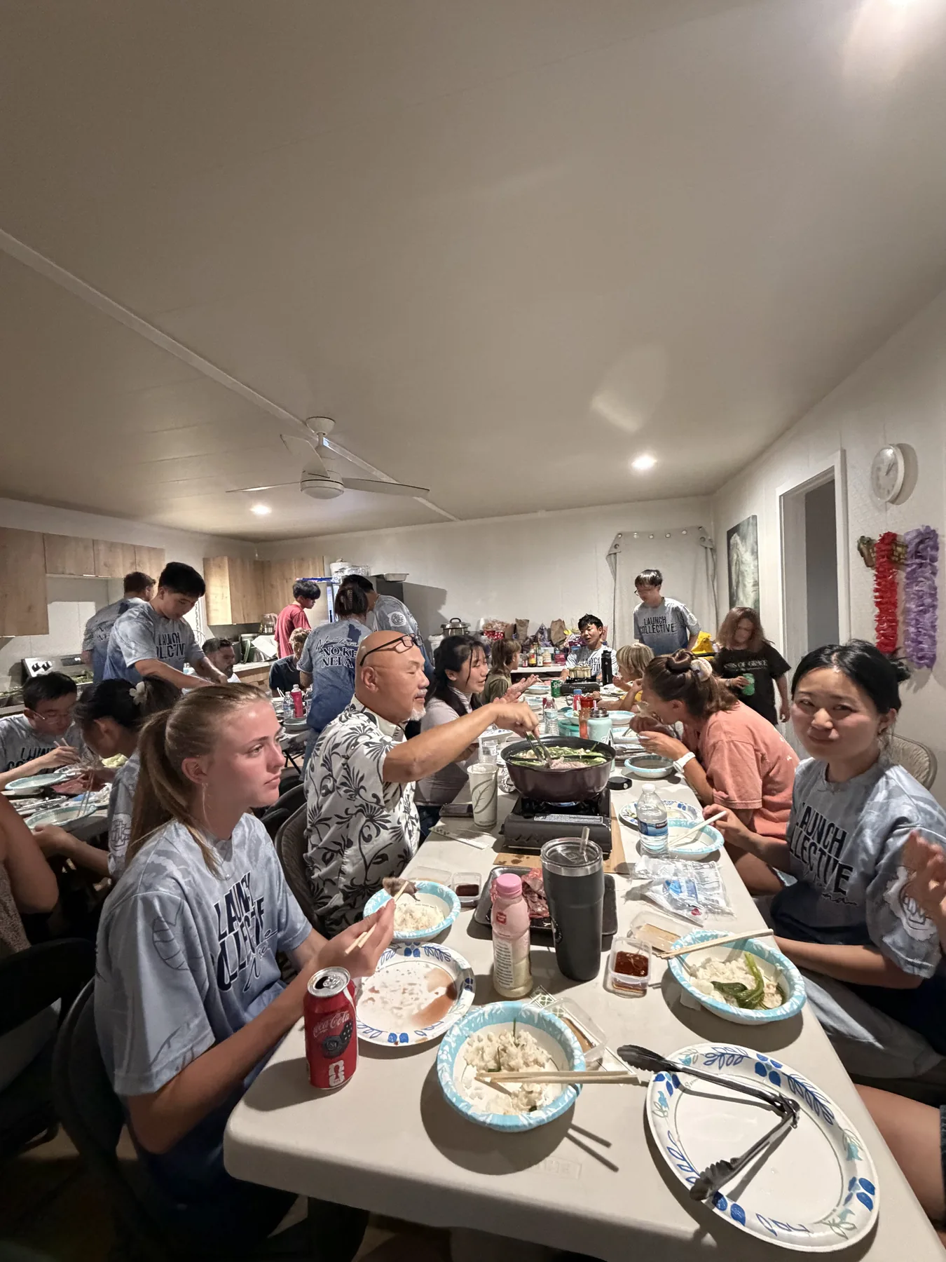 The team gathered around long tables for hotpot dinner.